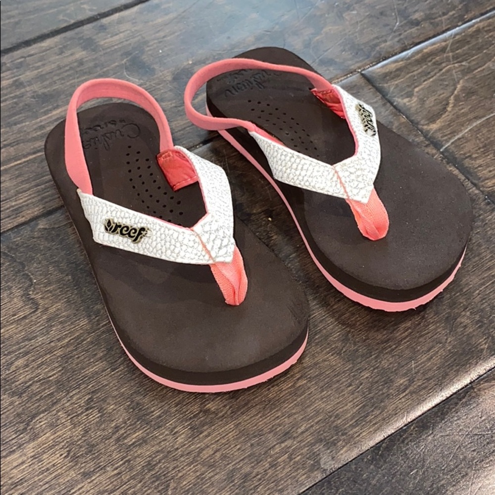 Brand new reef flip flops for kids